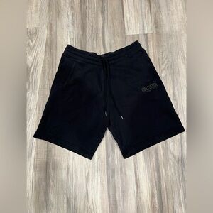 Hollister men's black fleece drawstring shorts with an embroidered logo.